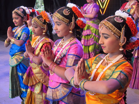 Four girls dressed up in traditional Hindu & Diwali clothes.